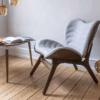 A Conversation Piece Lounge Chair by Umage